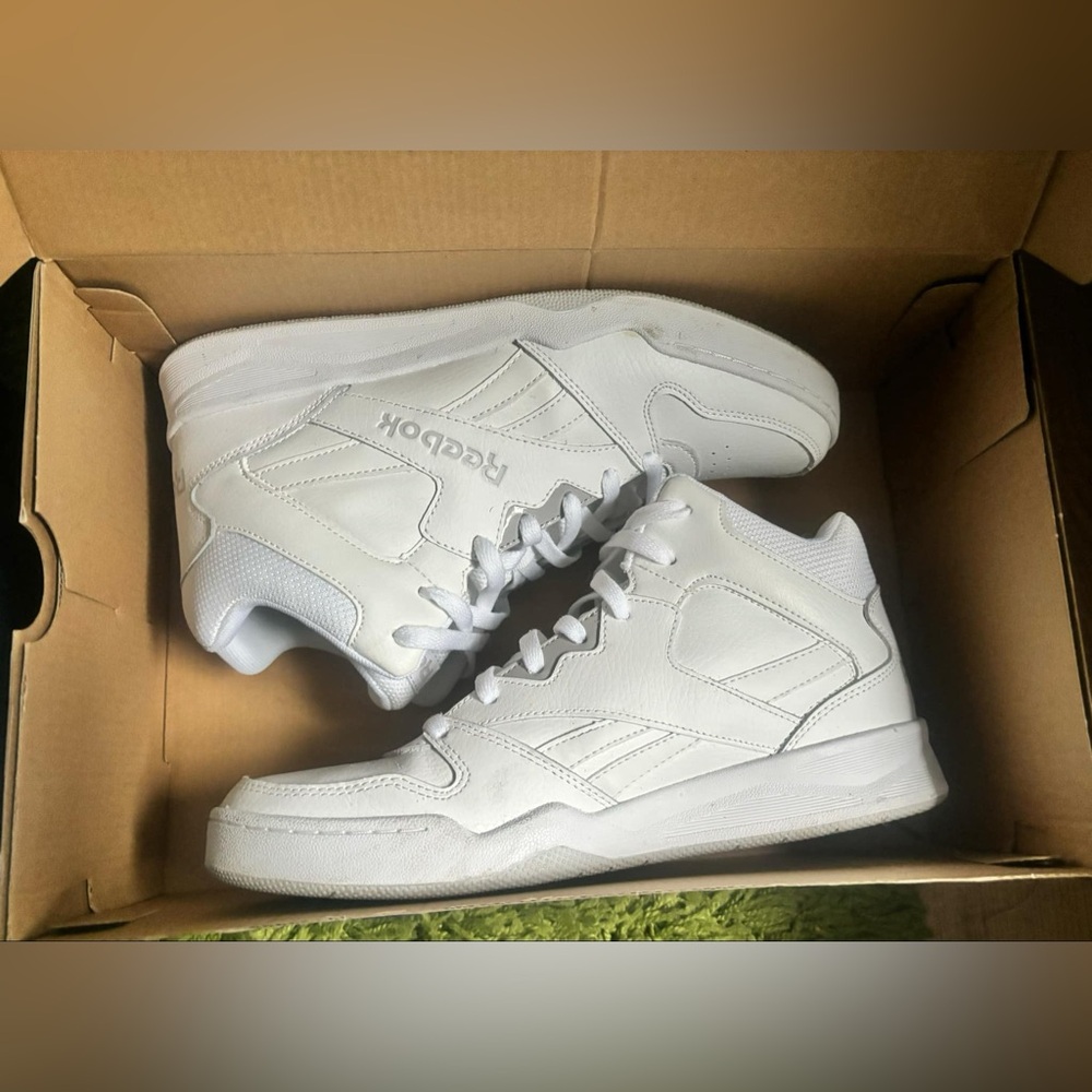 2 PAIRS, priced for one- White Reeboks men’s size 9.5